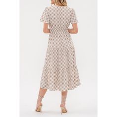 Introducing our August Sky Women's Round Split Neckline Printed Tiered Midi Dress, a delightful addition to your wardrobe. Featuring a split v-neckline and short flounce sleeves, it exudes feminine charm. The elastic waistline ensures a flattering fit, while the all-over geometric print adds a stylish touch. The tiered skirt enhances its playful elegance, and the dress is fully lined for comfort. Crafted from non-stretch fabric, this midi dress is perfect for any occasion, from casual outings to Beige Floral Print V-neck Midi Dress, White Casual Midi Dress With Surplice Neckline, Casual White Midi Dress With Surplice Neckline, Beige Midi Dress With Surplice Neckline For Spring, Beige Surplice Neckline Midi Dress For Spring, Summer Beige Midi Dress With Surplice Neckline, Beige Midi Dress With Surplice Neckline For Summer, Dress Cream, Wide Stripes