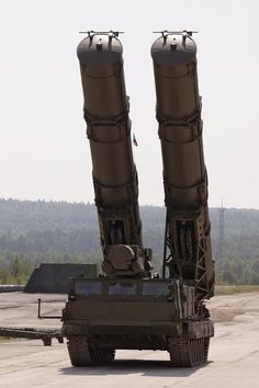 an army vehicle with two missiles attached to it