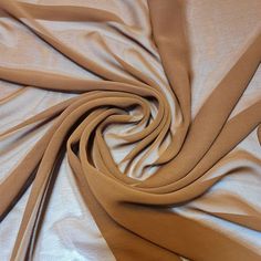 a close up view of a tan fabric