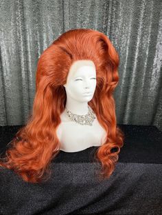 "This beautiful lace front synthetic wig will be custom styled, just for you! Images in this listing are an example of this classic big and beautiful, single wig hairstyle. Prior to your custom styled wig shipping, I will send you multiple pictures to guarantee you are satisfied with the finished result.  Processing time is 4-6 weeks. Lace front wigs can fit a variety of head sizes, up to 23.5\" Due to the nature of this item, all sales are final. Please reach out if there is anything I can help with. All wigs are shipped securely in a 12\" x 12\" x 12\" box. I'm open to special orders and custom styles and colors. Please feel free to reach out with any questions." Drag Wigs, Multiple Pictures, Fake Hair, Custom Wigs, Synthetic Wig, Book Decor, Big Hair, Hair Designs, Synthetic Wigs