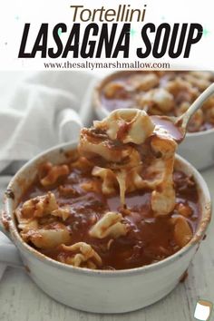 tortelli lasagna soup in a white bowl with a spoon full of pasta