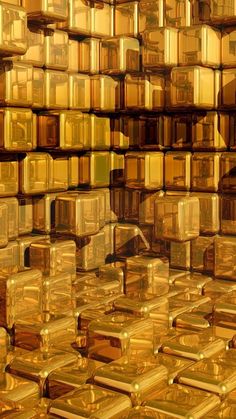 an abstract image of gold cubes stacked on top of each other