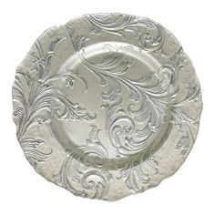 an ornate silver plate with swirls and scrolls on the rim, isolated against a white background