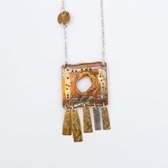 NKL Mixed Metal Square Fringe Necklace Artisan Square Pendant Necklace For Jewelry Making, Artsy Silver Necklace With Unique Variations, Artisan Rectangular Pendant Necklace As A Gift, Artisan Rectangular Pendant Necklace For Gift, Artsy Brass Dangle Jewelry, Unique Soldered Dangle Jewelry, Artisan Necklace With Rectangular Pendant As A Gift, Handmade Long Necklace With Fusion Style, Unique Long Brass Necklace