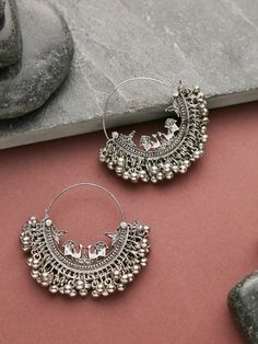 A Beautiful Jewelry always adds a charm to your personality. This Oxidised Silver Lightweight Chandbali Peacock Hoop Earrings is perfectly designed to spice up your look. Complex in design, with decorative pieces inspired by ethnic designs, the delicate work and perfect finishing make these Bali Earrings a great accessory for semi-formal occasions. Add charm and charisma to your beautiful personality with these exquisitely designed and handcrafted earrings. Pair them up with any casual or semi f Junk Jewellery, Silver Indian Jewelry, Beautiful Personality, Oxidised Silver Jewelry, Bali Earrings, Fancy Jewellery Designs, Indian Jewellery Design Earrings, Traditional Earrings, Pakistani Jewelry