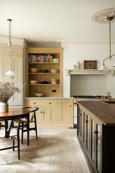 the kitchen is clean and ready to be used as a dining room or family room