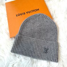 Bought For My Husband But He Rarely Wore It. He Cut Off The Long Tag Inside That Has The Materials Written On It But It Is Not Noticeable And You Wouldn’t Be Able To Tell If I Did Not State It Here. Beanie Retails For $560 So Get It Here Below Retail! It’s In Excellent Condition And Comes With Original Box And Ribbon. Posh Authenticates Items $500 Or More For Free. Buy From A Trusted Posh Ambassador- Check My Reviews!! 100% Cashmere Beanie With Enamel Lv Logo On The Side. Beanie Is Like New- Does Not Have Any Rips Or Pilling! This Item Is Giftable, Even The Tissue Paper Doesn’t Have Any Wrinkles. Grey Color Makes It A Great Neutral To Go With Any Outfit. Only Reasonable Offers Will Lv Beanie, Lv Logo, Cashmere Beanie, Louis Vuitton Accessories, Grey Color, My Husband, Tissue Paper, Cut Off, To Tell