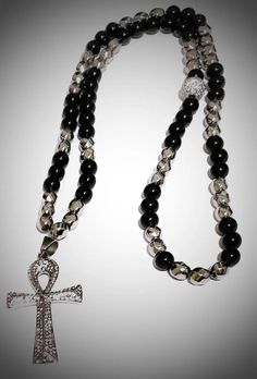 Black and Silver Ankh Necklace freeshipping - L.Signature Collection by L.Styles Ankh Necklace Aesthetic, Adjustable Hematite Necklace With Black Beads, Black Spiritual Crystal Necklace With Faceted Beads, Spiritual Black Crystal Necklaces With Faceted Beads, Spiritual Black Crystal Necklace With Faceted Beads, Silver Spiritual Cross Beaded Necklace, Silver Cross Beaded Necklace For Spiritual Style, Silver Hematite Beaded Necklace With Polished Beads, Spiritual Silver Cross Beaded Necklace