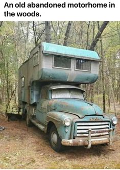 an old abandoned motorhome in the woods is being used as a camper