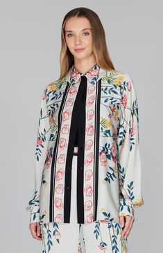 A softened take on a collared shirt. This blouse features soft, drapey dolman sleeves and a classic shirt collar. The Bramble print is beautifully placed to create elegant banding at the center front. Silk Shirt With Floral Print And Spread Collar, Elegant Patterned Shirt With Spread Collar, Multicolor Spread Collar Blouse For Spring, Spring Collared Shirt With Blouson Sleeves, Elegant Shirt With Floral Print And Spread Collar, Elegant Printed Blouse With Spread Collar, Spring Floral Print Blouse With Spread Collar, Silk Top With Floral Print And Spread Collar, Collared Silk Blouse For Spring