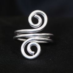 Spiral Ring, Brass Swirl Ring, Adjustable Ring, Boho Ring, Single Coil Ring, Handmade Ring, Ring For Women, Minimalist Ring, Gift Item Gemstone: Na Jewelery Category:- Handmade Ring Metal:-Brass -- T H E * Q U A L I T Y We buy raw gemstones directly from miners and then get them cut and polished at our workshop , Therefore saving some bucks (additional added fees and markups) avoiding a middle man and making sure of the authenticity of the gems. And we use top quality materials that are water sa Modern Twist Spiral Stackable Rings As Gift, Adjustable Spiral Rings With A Modern Twist, Silver Spiral Wire Wrapped Rings, Adjustable Spiral Ring With A Modern Twist, Adjustable Spiral Ring With Modern Twist, Handmade Spiral Minimalist Rings, Handmade Minimalist Spiral Rings, Minimalist Handmade Spiral Rings, Handmade Adjustable Swirl Ring