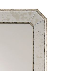 a mirror that is sitting on top of a table