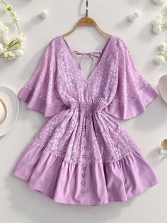 Features: Lace, Cutout, Smocked Sheer: Semi-sheer Stretch: No stretch Body: Lined Material composition: 95% polyester, 5% spandex Care instructions: Machine wash cold. Tumble dry low. Imported Size US Length Bust HIP Sleeve Length S 4 49.6 33.9 41.7 16.5 M 6/8 50.4 35.4 43.3 16.9 L 10 51.2 37 44.9 17.3 XL 12 52 38.6 46.5 17.7 Beach Mini Dress With Smocked Back And Stretch, Chiffon Stretch Beach Dress, Stretch Chiffon Beach Dress, Feminine Stretch Dresses For Beach, Feminine Stretch Dresses For The Beach, Beach Chiffon Dress With Smocked Bodice, Lace Cutout, Mini Robes, Maxi Dress Cocktail