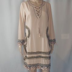 New Whit Tags Venus Beige Beaded Embellished Long Slevee Tassel Tie Dress Size Small Shell Fabric /Exterior 100% Polyester The Measurements Are In The Photos New With Small Stains Long Sleeve Embellished Festival Dress, Embellished Mini Dress For Vacation And Spring, Spring Embellished Mini Dress For Vacation, Spring Beach Beaded Dress, Spring Vacation Embellished Mini Dress, Spring Vacation Beaded Dresses, Bohemian Embellished Mini Dress, Bohemian Long Sleeve Beaded Dress, Bohemian Beaded Dresses For Spring