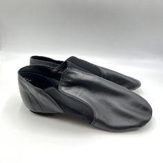 Capezio Adult E-Series Black Leather Slip On Jazz Shoes. Model Style Number Ej2a | Ej2 Adult. Adult Size 14 Wide Width. This Is The Fit Advice From Capezio's Website: "Women Begin 1/2 Size Up From Street Shoe Size. Men Begin 2.5 Sizes Up From Street Shoe Size." Condition: New Without Box. Note There Is Some Natural Creasing Of The Leather As Pictured. New To Poshmark? Sign Up Using Invite Code: Tentoday For $10 Off Your Purchase! Capezio's "E" Series Slip-On Jazz Shoe Features A Low Profile Desi Luxury Closed-toe Dance Shoes With Leather Sole, Leather Dance Shoes With Closed Toe, Leather Slip-on Dance Shoes, Leather Closed Toe Dance Shoes With Branded Insole, Leather Dance Shoes With Round Toe, Leather Dance Shoes With Round Toe And Leather Sole, Fitted Black Dance Shoes For Dance Class, Leather Dance Shoes With Removable Insole And Round Toe, Formal Slip-on Dance Shoes With Rubber Sole