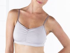 The Astrid Bralette is a soft, cute, supportive bralette designed for everyday comfort. It is also the ideal piece to wear after lumpectomy, unilateral or bilateral mastectomy, explant surgery, cosmetic surgery and reconstruction. Made with two layers of ultra-luxe, sustainable jersey to soothe sensitive skin, plus an internal layer of power mesh for added support. Designed to accommodate arm mobility limitations, it can be stepped into or pulled on overhead. By far our most versatile style, the Explant Surgery, Seamless V-neck Stretch Sports Bra, Bilateral Mastectomy, Breathable Micro-elastic Nylon Sports Bra, V-neck Sports Bra With Built-in Bra And Medium Support, Compressive Seamless V-neck Sports Bra, Medium Support V-neck Sports Bra, Light Exercise, Soft Cute