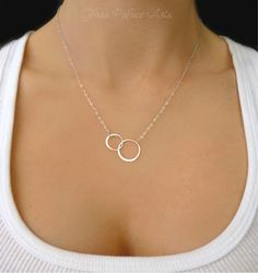 "Simple and dainty Infinity necklace - In Gold, Rose Gold or 100% Sterling Silver - 24k gold vermeil, rose gold vermeil or sterling silver interlocking hoops are 1\" long - Chain is a shimmery 14k gold fill, rose gold fill or sterling silver - Total necklace length including interlocking circles is shown at 19\" - Infinity has a tiny stamp of authenticity of sterling or 24k gold on one side - Necklace closes with a 14k gold fill, rose gold fill or sterling silver spring clasp Need a pair of matc Double Circle Necklace, Infinity Necklace Gold, Interlocking Circle Necklace, Present For Mom, Push Present, Circle Jewelry, Mother Daughter Necklace, Sister Jewelry, Sister Necklace