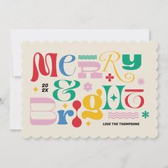 a greeting card with the words merry and bright on it in multi - colored letters