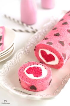 a collage of photos showing how to make a heart shaped cake