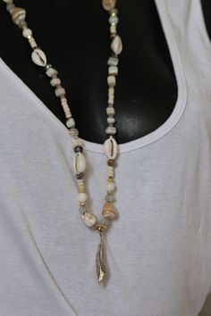 long necklace necklace in 8 mm pearls and squares of mother-of-pearl, large trochus, shells, bohemian crystals, coconut wood, metal leaf pendant Coconut Wood, Bohemian Crystal, Metal Leaves, Necklace Necklace, Shell Necklace, Leaf Pendant, Shell Necklaces, Wood Metal, Long Necklace