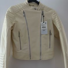 Zara Bnwt “Leather” Jacket. White/Cream Trendy White Leather Biker Jacket, Chic Cream Leather Jacket With Zipper Closure, Cream Leather Jacket With Zipper For Spring, Casual White Leather Jacket With Zipper, Casual White Leather Jacket With Zipper Closure, White Fitted Chic Leather Jacket, Cream Leather Long Sleeve Jacket, Cream Leather Jacket With Long Sleeves, Trendy White Leather Jacket With Long Sleeves