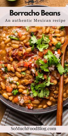 mexican beans in a skillet with cilantro and parsley on the side