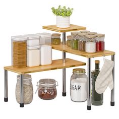 three tiered shelving unit with jars and spices