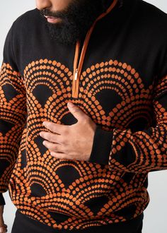 Style#: M7005 Cozy up this fall in the Kibo Men's African Print Quarter-Zip Sweater in Black Amber Dots. It's the perfect layering piece that spices up any outfit. Features: Gold metal zip Contrast rib knit with at-sleeve cuff and mock neck Contrast black knit sleeves shoulder and upper chest 45% Cotton/55% Acrylic Knit Designed in the USA, imported Care Instructions: Hand wash cold. Do not soak. Do not bleach. Lay flat to dry. Models: Size: M | Height 6’ | Chest 38.5” | Waist 33” Size: L | Heig Quarter Zip Sweater, Knit Sleeve, Sleeve Cuff, Mens Fall, Workout Accessories, Printed Bags, Zip Sweater, Sweater Black, Black Knit