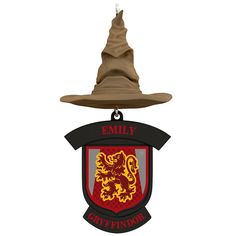 a harry potter hat hanging from the side of a sign