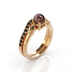 Set 14k Rose gold black pearl ring with 2 side black diamond & black diamond wedding band Black Freshwater Pearl engagement ring with lovely diamonds, set in 14k solid gold. ► FEATURES; Engagement ring. Gemstones: Freshwater black Pearl: 4- 5mm , Black Diamond: Total diamond carat weight: 0.03 Material options: 14k rose gold, 14k yellow gold, 14k white gold wedding band Black Diamond: 17X1.5mm Total diamond carat weight: 0.25 Material options: 14k rose gold, 14k yellow gold, 14k white gold H Black Luxury Pearl Ring For Formal Occasions, Classic Black Pearl Ring For Wedding, Black Pearl Ring For Formal Occasions, Black Pearl Ring For Wedding In Fine Jewelry Style, Black Pearl Ring For Wedding, Fine Jewelry, Fine Jewelry Black Pearl Ring For Wedding, Pearl Engagement Ring Set, Black Pearl Ring, Black Diamond Wedding Bands