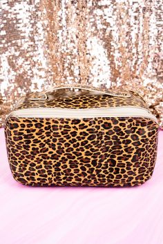 Stay organized and stylish with our Leopard Expandable Makeup Bag! Made with faux leather and an allover design, this multi-functional bag features zip and open elastic pockets for all your cosmetics, skin care, or valuables. With a top carrying handle and zip closure, it's perfect for home or travel. 🐆💄🛍️ Large Capacity Rectangular Toiletry Storage For Travel, Trendy Large Capacity Cosmetic Bag For Travel, Trendy Rectangular Cosmetic Bag For On-the-go, Trendy Large Capacity Travel Cosmetic Storage, On-the-go Tote Cosmetic Bag With Removable Pouch, Trendy Travel Cosmetic Tote Bag, On-the-go Travel Bag With Zipper Closure, Zipper Closure Travel Bag Pouch For On-the-go, Portable Cosmetic Pouch With Zipper Closure