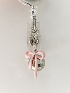 You can easily hook it to your badge reel, purse, backpack, keys or anywhere you would like! Choose color of bow at checkout!  badge reel not included Pink Badge Holder With Swivel Clip As Gift, Pink Badge Reel With Swivel Clip As Gift, Ball Mirror, Disco Ball Mirror, Nursing Teacher, Teacher Badge, Purse Backpack, Mirror Ball, Nurse Badge