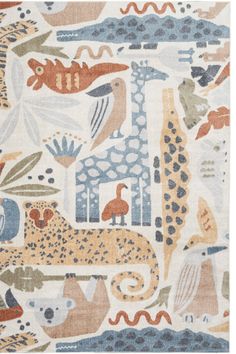 an animal themed rug with various animals on the ground and in different colors, shapes and sizes