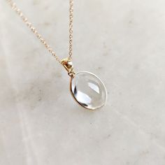 This stunning Pendant is set in 14k Solid Yellow Gold with Natural Clear Quartz with utmost precision. It is a unique gemstone Pendant for nearly every occasion and is completely hassle-free jewelry. ITEM DETAILS: * GEM: Clear Quartz * GEM SIZE: 12X16mm * GEM SHAPE: Oval * GEM WEIGHT: 10.60 carats * Gold Purity: 14KT * Gold Weight: 0.60 gram * Total Weight: 2.72 gram The Gold purity is guaranteed and it comes with authentic 14KT gold hallmark. Since my items are handmade, they are absolutely nickel and lead free. CUSTOMIZATION: * Gemstone customization is available and it can be substituted with a gem of your choice. Kindly message me for the same. PACKAGING * The Pendant comes with layers of safe and secure wrapping along with Free handmade jewelry box with every purchase. ➡️Head to these Faceted 14k Gold Round Jewelry, Elegant Round Rose Cut Diamonds, Fine Jewelry With Rose Cut Diamonds In Oval Pendant, Fine Jewelry With Rose Cut Diamonds Oval Pendant, Faceted Diamond Necklace For Anniversary, Elegant Jewelry With Bezel Setting For Gift, Elegant Jewelry With Bezel Setting As A Gift, Elegant Bezel Setting Jewelry Gift, Elegant Clear Gemstone Jewelry