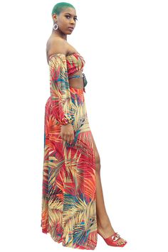 This is a multi-functional, off-shoulder 2-piece maxi skirt set/cover-up that features two deep side splits, long loose puffer sleeves, and a front tie. The maxi skirt has under panties attached. Multicolor tropical pattern. Size range from small to 2x. Great for poolside/vacation wear. Off-shoulder Summer Vacation Sets, Summer Off-shoulder Vacation Sets, Two-piece Long Skirt Dress For Vacation, Off-shoulder Beach Sets For Spring, Vacation Maxi Skirt With Side Slits, Beach Maxi Skirt With Side Slits, Off-shoulder Maxi Dress For Beach Season, Summer Vacation Maxi Length Sets, Bohemian Two-piece Maxi Dress