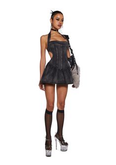 This mini dress has a denim construction, a washed finish, a halter neckline with an adjustable buckle closure, paneling, cut out details, and a back zipper closure. Black Denim Mini Dress For Night Out, Edgy Mini Corset Dress For Summer, Edgy Mini Length Corset Dress For Summer, Edgy Mini-length Corset Dress For Spring, Edgy Mini Length Corset Dress For Spring, Black Denim Mini Dress, Halloween Costume Boots, Costume Boots, Booties Outfit