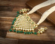 This is a stunning handmade necklace perfect for high end Jewelry Collector, a keeper in Traditional Vintage Indian/Pakistani Bridal jewelry and a Luxury Gift for your Daughter, Sister or Wife on Wedding or Anniversary. Perfect for any type of occasions, weddings And celebrations and a beautiful & memorable gift for weddings and special occasions. Description  Item Code:- L9677 Meenakari Kundan Necklace Set w/ Earrings  Necklace Measures- 11" Long Adjustable with a Dori/Cord Earring Measures- 60x20mm approx Quantity- One Necklace Set Please see more different designs here:- https://www.etsy.com/in-en/shop/LUCKYJEWELSART?ref=seller-platform-mcnav I make every item of my collection with a lot of love and care, I pay attention to every detail.  You are more than welcome to contact me for any Polki Diamond Necklace, White Beaded Necklace, Pakistani Bridal Jewelry, White Beaded Necklaces, Earrings Trendy, Diamond Necklace Set, Kundan Necklace, Kundan Necklaces, Necklace White