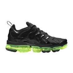 Find NIKE Air Vapormax Plus ' Volt on Editorialist. The Nike Air VaporMax Plus 'Black Volt' sneaker adds a splash of neon green to a glossy black upper for an elevated touch on the innovative silhouette. The hybrid design borrows from the Air Max Plus and the VaporMax and introduces a revamped Air unit, skillfully attached directly to the upper—without foam—allowing the foot to feel the responsive, springy step more than ever before. Rubber pods are placed strategically in high-wear areas to help enhance durability. Nike Air Max Vapormax Plus, Green Lace-up Sneakers With Shock Absorption, Dynamic Nike Air Max Running Shoes For Streetwear, Streetwear Sneakers With Air Cushioning, Sporty Neon Low-top Sneakers, Nike Athleisure Running Shoes With Shock Absorption, Athleisure Basketball Shoes With Air Max Cushioning For Streetwear, Nike Air Max Dynamic Streetwear, Nike Urban Basketball Shoes With Air Max Cushioning