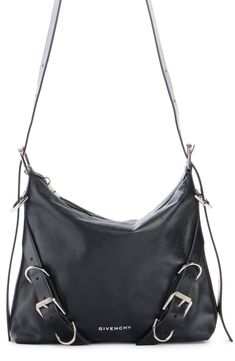 The Voyou style crosses over into a versatile crossbody bag shaped from supple calfskin leather and featuring a buckle-adjustable strap echoed in the detailing. Top zip closure Adjustable strap Leather Made in Italy Crossbody Hobo Bag With Gunmetal Hardware For Evening, Gunmetal Hardware Crossbody Hobo Bag For Evening, Evening Leather Shoulder Bag With Buckle Closure, Travel Crossbody Saddle Bag With Buckle Closure, Travel Saddle Bag With Buckle Closure, Crossbody Style, Leather Satchel Saddle Bag With Buckle Closure, Modern Leather Satchel With Buckle Closure, Leather Saddle Bag With Buckle Closure, Leather Saddle Bag With Buckle Closure Satchel