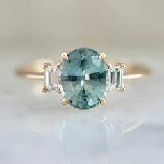 Custom Oval Teal Sapphire Engagement Ring by Gem Breakfast Teal Sapphire Engagement Ring, Teal Sapphire, Sapphire Engagement Ring, Sapphire Engagement, Engagement Rings Sapphire, Custom Rings, Bridal Jewelry