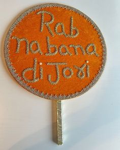 an orange racquet with the words rad weekend dj's on it