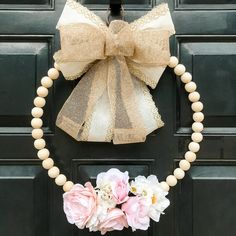 a wreath is hanging on the front door