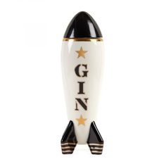 a small white and black rocket with the word gin on it