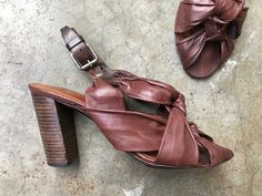 "Dries Van Noten. Size 37. Insole heel to toe: 9 5/8\" (24.5cm) heel: 3 5/8\" (9.2cm) ball width: 3.25\" (8.2cm)" Brown High Heel Slingback Pumps With Wrapped Heel, Brown Slingback Pumps With Wrapped Heel For Spring, Brown Slingback Pumps With Stacked Heel, Brown Slingback Sandals With Ankle Strap And Wrapped Heel, Brown Slingback Sandals With Heel Loop For Spring, Brown Slingback Sandals With Wrapped Heel And Ankle Strap, Brown Ankle Strap Slingback Sandals With Wrapped Heel, Brown Slingback Sandals For Spring, Vintage Slingback Heels For Spring