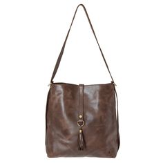 This eco-friendly, full grain leather slingback is perfect for the girl looking for functionality! It serves as a slouchy bucket bag, crossbody, and backpack! A beautifully hand-made piece, just pull on the straps for an over the shoulder look, or wear it like a crossbody to mix this bag into your on-the-go lifestyle. This bag is fully-lined and comes with a detachable fringe accessory. With plenty of storage and zip compartments to keep your tablet and valuables safe, this backpack is perfect f Fringe Accessories, Tassels Fashion, Key Clip, Water Bottle Holders, Genuine Leather Bags, Full Grain Leather, Cowhide Leather, Bag Making, Inside Pocket