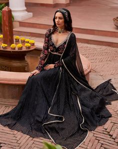 Presenting this exquisite black full-sleeve anarkali, adorned with intricate hand-embroidered detailing on the yoke for an elegant touch. The allure continues with a black lurex georgette flair, enhanced with cancan for added volume and grace. Elevate your ensemble with this timeless piece, perfect for making a statement at any special occasion. Embroidered Anarkali, Anarkali, Full Sleeve, Timeless Pieces, A Black, Hand Embroidered, Special Occasion, Black