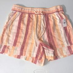 Brand New With Tags Gap Women’s Light Pink Stripes Pull On Lounge Shorts Size Small. These Shorts Give Beachy Vacation Vibes! Could Be Used Over A Swimsuit Or For Everyday Wear! Bundle And Save 10%! Smoke Free Home. Cart Multiple Items And I Will Send An Offer! This Is A Final Sale, I Do My Best To Disclose Any Flaws Or Damage But Please Review All Photos Before Purchasing And Read The Description. Please Do Not Hesitate To Message Me Or Comment With Any Additional Questions. Thank You And Happy Gap Cotton Pajama Shorts Casual Style, Gap Cotton Casual Pajama Shorts, Casual Striped Pajama Shorts For Beach, Gap Casual Cotton Pajama Shorts, Casual Cotton Pajama Shorts By Gap, Pink Cotton Pajama Shorts For Vacation, Spring And Summer Drawstring Shorts, Striped Beach Shorts With Pockets, Gap Pink Cotton Bottoms