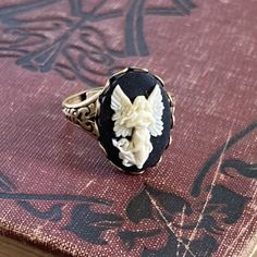 Angel Cameo Ring in Antiqued Brass or Silver | Ragtrader Vintage Cameo Ring Antique, Vintage Adjustable Cameo Rings, Opera Wedding, Darkest Academia, Cosplay Fashion, Interesting Jewelry, Typewriter Keys, Cute Angel, Pocket Watch Necklace