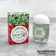 a bottle of soap next to a box with the label made in the north pole