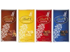 three boxes of lindt's indoor chocolates, each with different flavors and flavors